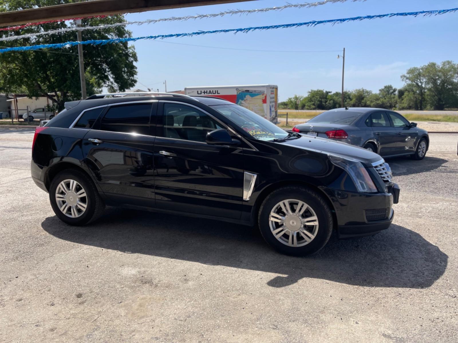 2015 BLACK CADILLAC SRX LUXURY COLLECTION (3GYFNBE35FS) with an 3.6L engine, Automatic transmission, located at 124 Elm St., Cibolo, TX, 78108, (210) 658-3118, 29.559427, -98.232384 - www.discountautosinc.com TEXT QUESTIONS TO 210-900-3118 41 MONTHLY PAYMENTS OF $365 WITH $2695 DOWN AND FINAL ODD PAYMENT OF $123.35 W/FIRST PAYMENT DUE 30 DAYS FROM DATE OF SALE. FEATURE: LEATHER HEATED SEATS, BACK UP CAMERA, SKY SUN ROOF WARRANTY ON ENGINE and TRANSMISSION ON - Photo #10