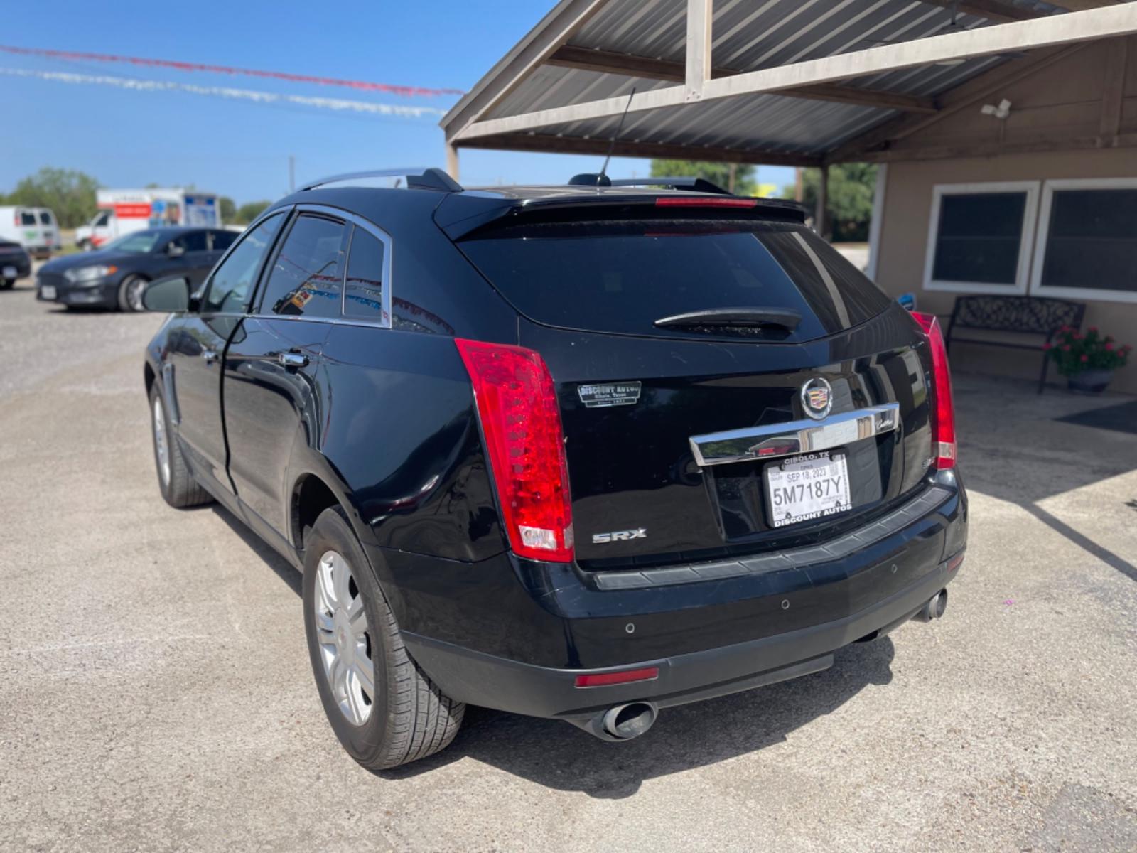 2015 BLACK CADILLAC SRX LUXURY COLLECTION (3GYFNBE35FS) with an 3.6L engine, Automatic transmission, located at 124 Elm St., Cibolo, TX, 78108, (210) 658-3118, 29.559427, -98.232384 - www.discountautosinc.com TEXT QUESTIONS TO 210-900-3118 41 MONTHLY PAYMENTS OF $365 WITH $2695 DOWN AND FINAL ODD PAYMENT OF $123.35 W/FIRST PAYMENT DUE 30 DAYS FROM DATE OF SALE. FEATURE: LEATHER HEATED SEATS, BACK UP CAMERA, SKY SUN ROOF WARRANTY ON ENGINE and TRANSMISSION ON - Photo #3