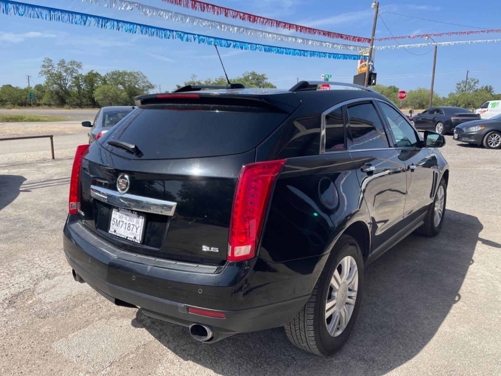 2015 BLACK CADILLAC SRX LUXURY COLLECTION (3GYFNBE35FS) with an 3.6L engine, Automatic transmission, located at 124 Elm St., Cibolo, TX, 78108, (210) 658-3118, 29.559427, -98.232384 - www.discountautosinc.com TEXT QUESTIONS TO 210-900-3118 41 MONTHLY PAYMENTS OF $365 WITH $2695 DOWN AND FINAL ODD PAYMENT OF $123.35 W/FIRST PAYMENT DUE 30 DAYS FROM DATE OF SALE. FEATURE: LEATHER HEATED SEATS, BACK UP CAMERA, SKY SUN ROOF WARRANTY ON ENGINE and TRANSMISSION ON - Photo #4
