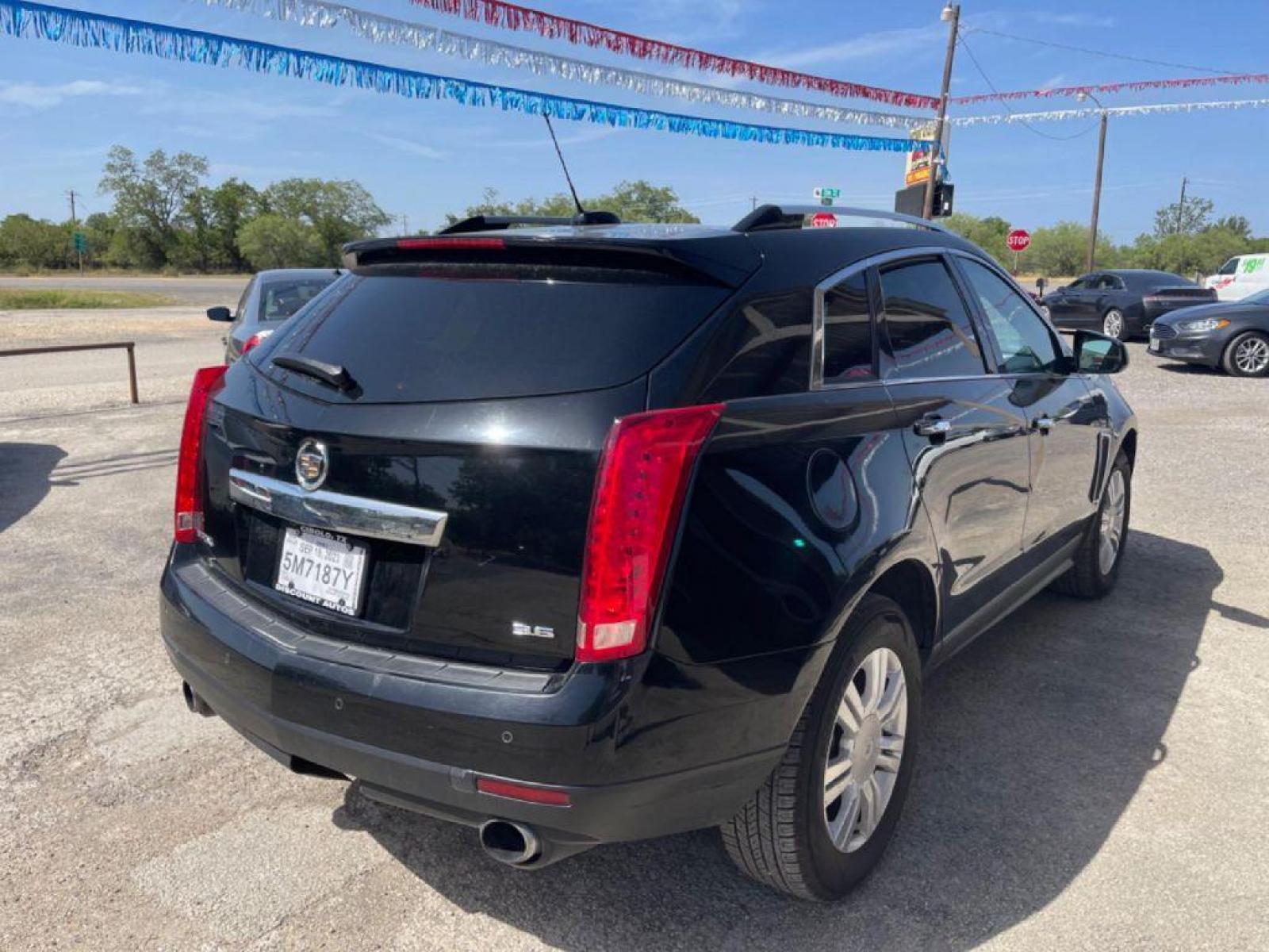 2015 BLACK CADILLAC SRX LUXURY COLLECTION (3GYFNBE35FS) with an 3.6L engine, Automatic transmission, located at 124 Elm St., Cibolo, TX, 78108, (210) 658-3118, 29.559427, -98.232384 - www.discountautosinc.com TEXT QUESTIONS TO 210-900-3118 41 MONTHLY PAYMENTS OF $365 WITH $2695 DOWN AND FINAL ODD PAYMENT OF $123.35 W/FIRST PAYMENT DUE 30 DAYS FROM DATE OF SALE. FEATURE: LEATHER HEATED SEATS, BACK UP CAMERA, SKY SUN ROOF WARRANTY ON ENGINE and TRANSMISSION ON - Photo #15