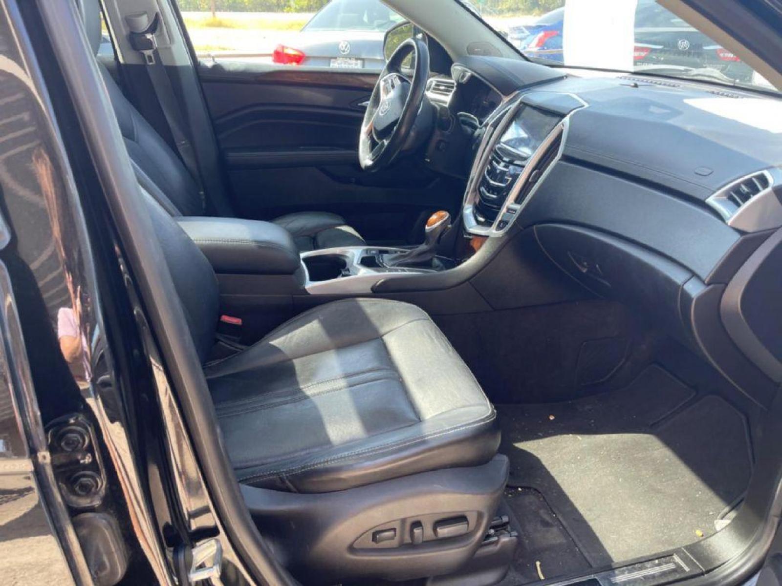 2015 BLACK CADILLAC SRX LUXURY COLLECTION (3GYFNBE35FS) with an 3.6L engine, Automatic transmission, located at 124 Elm St., Cibolo, TX, 78108, (210) 658-3118, 29.559427, -98.232384 - www.discountautosinc.com TEXT QUESTIONS TO 210-900-3118 41 MONTHLY PAYMENTS OF $365 WITH $2695 DOWN AND FINAL ODD PAYMENT OF $123.35 W/FIRST PAYMENT DUE 30 DAYS FROM DATE OF SALE. FEATURE: LEATHER HEATED SEATS, BACK UP CAMERA, SKY SUN ROOF WARRANTY ON ENGINE and TRANSMISSION ON - Photo #19