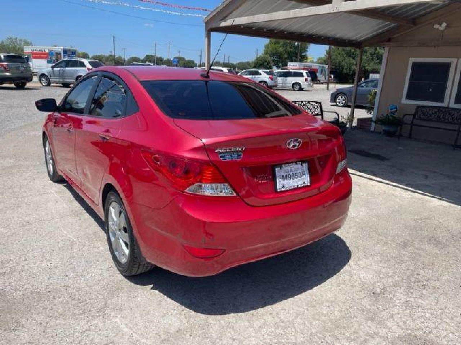 2014 RED HYUNDAI ACCENT GLS (KMHCU4AE8EU) with an 1.6L engine, Automatic transmission, located at 124 Elm St., Cibolo, TX, 78108, (210) 658-3118, 29.559427, -98.232384 - www.discountautosinc.com TEXT QUESTIONS TO 210-900-3118 35 MONTHLY PAYMENTS OF $285 WITH $1695 DOWN AND FINAL ODD PAYMENT OF $151.19 W/FIRST PAYMENT DUE 30 DAYS FROM DATE OF SALE. WARRANTY ON ENGINE and TRANSMISSION ONLY FOR 3 MONTHS OR 3,000 MLS. 36 MO'S TERM W/ 22.44 APR - Photo #8