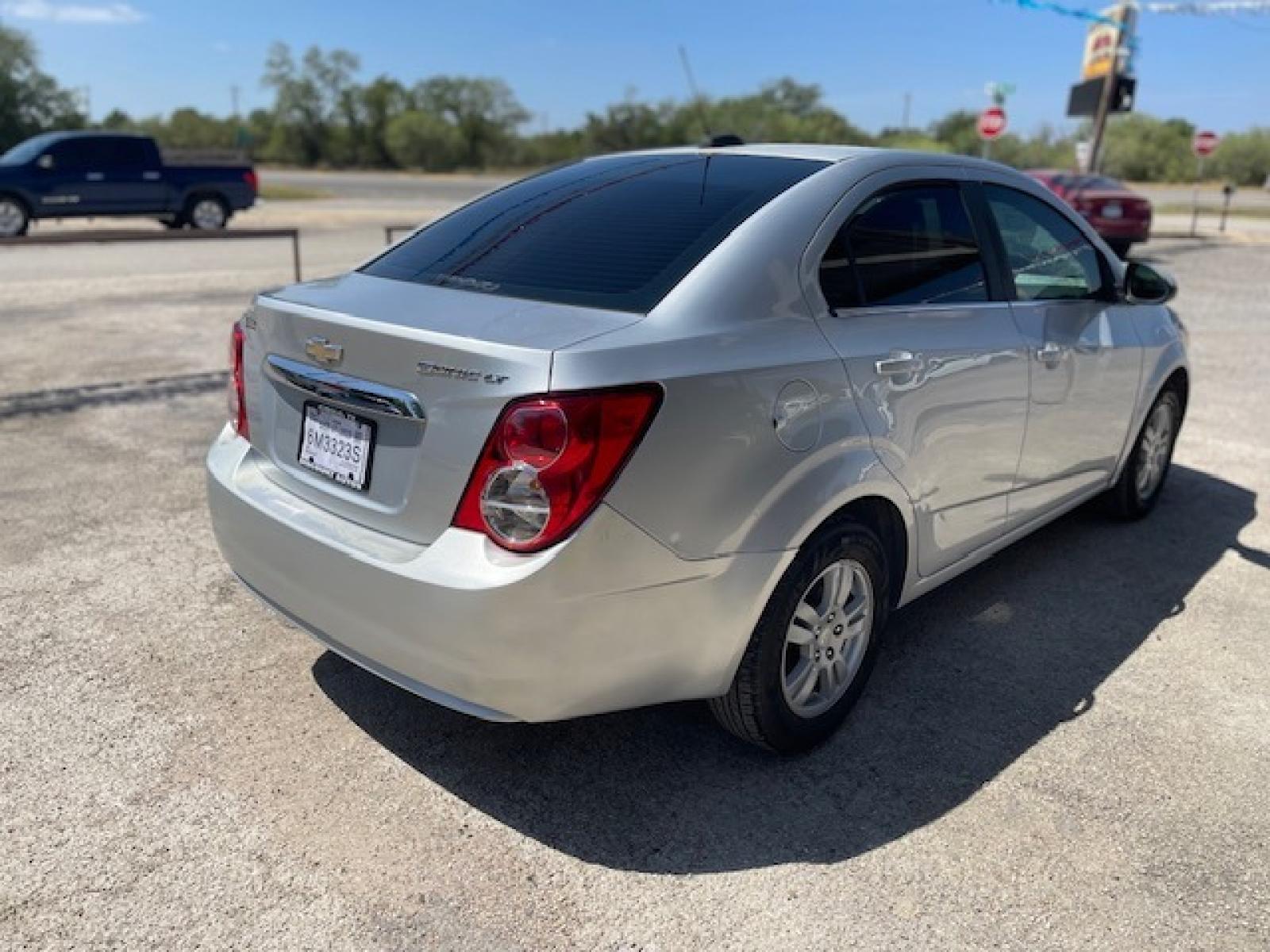 2015 SILVER CHEVROLET SONIC LT (1G1JC5SH6F4) with an 1.8L engine, Automatic transmission, located at 124 Elm St., Cibolo, TX, 78108, (210) 658-3118, 29.559427, -98.232384 - Photo #2