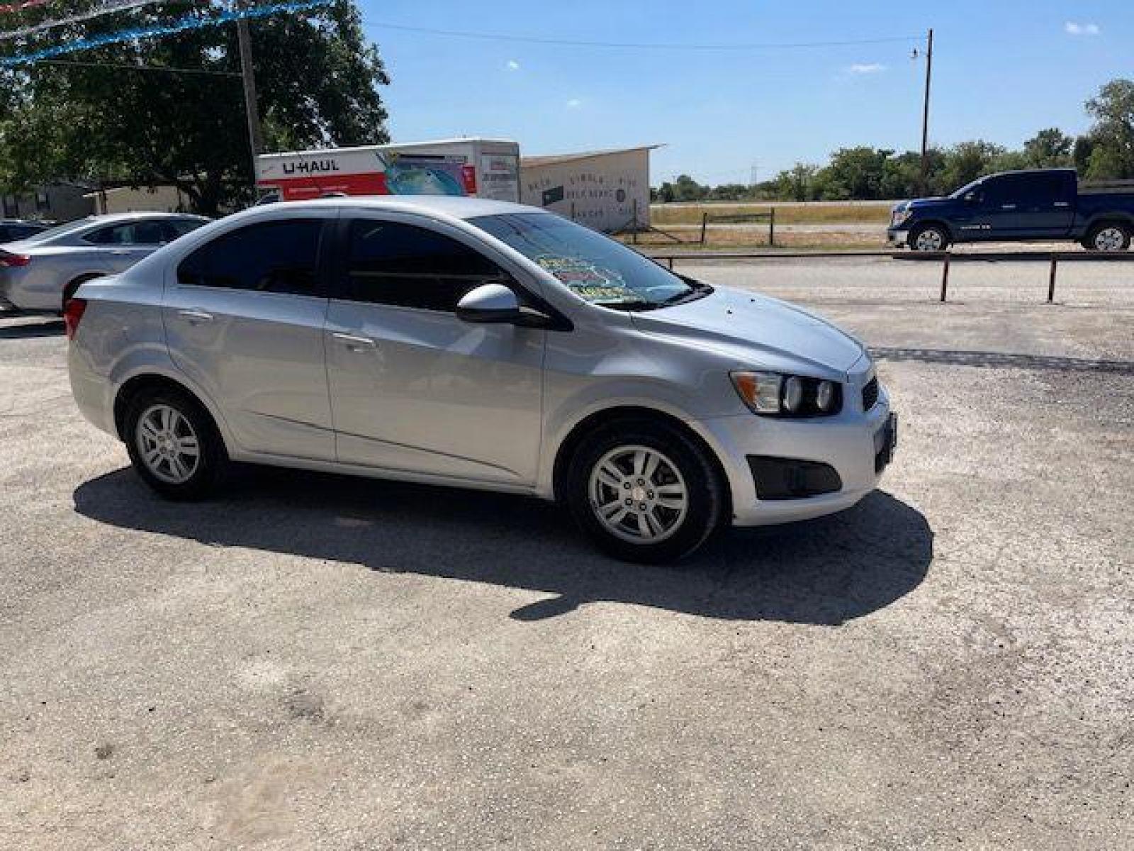 2015 SILVER CHEVROLET SONIC LT (1G1JC5SH6F4) with an 1.8L engine, Automatic transmission, located at 124 Elm St., Cibolo, TX, 78108, (210) 658-3118, 29.559427, -98.232384 - www.discountautosinc.com TEXT QUESTIONS TO 210-900-3118 35 MONTHLY PAYMENTS OF $295 WITH $1895 DOWN AND FINAL ODD PAYMENT OF $280.14 W/FIRST PAYMENT DUE 30 DAYS FROM DATE OF SALE. WARRANTY ON ENGINE and TRANSMISSION ONLY FOR 3 MONTHS OR 3,000 MLS. 36 MO'S TERM W/ 22.44 APR - Photo #15