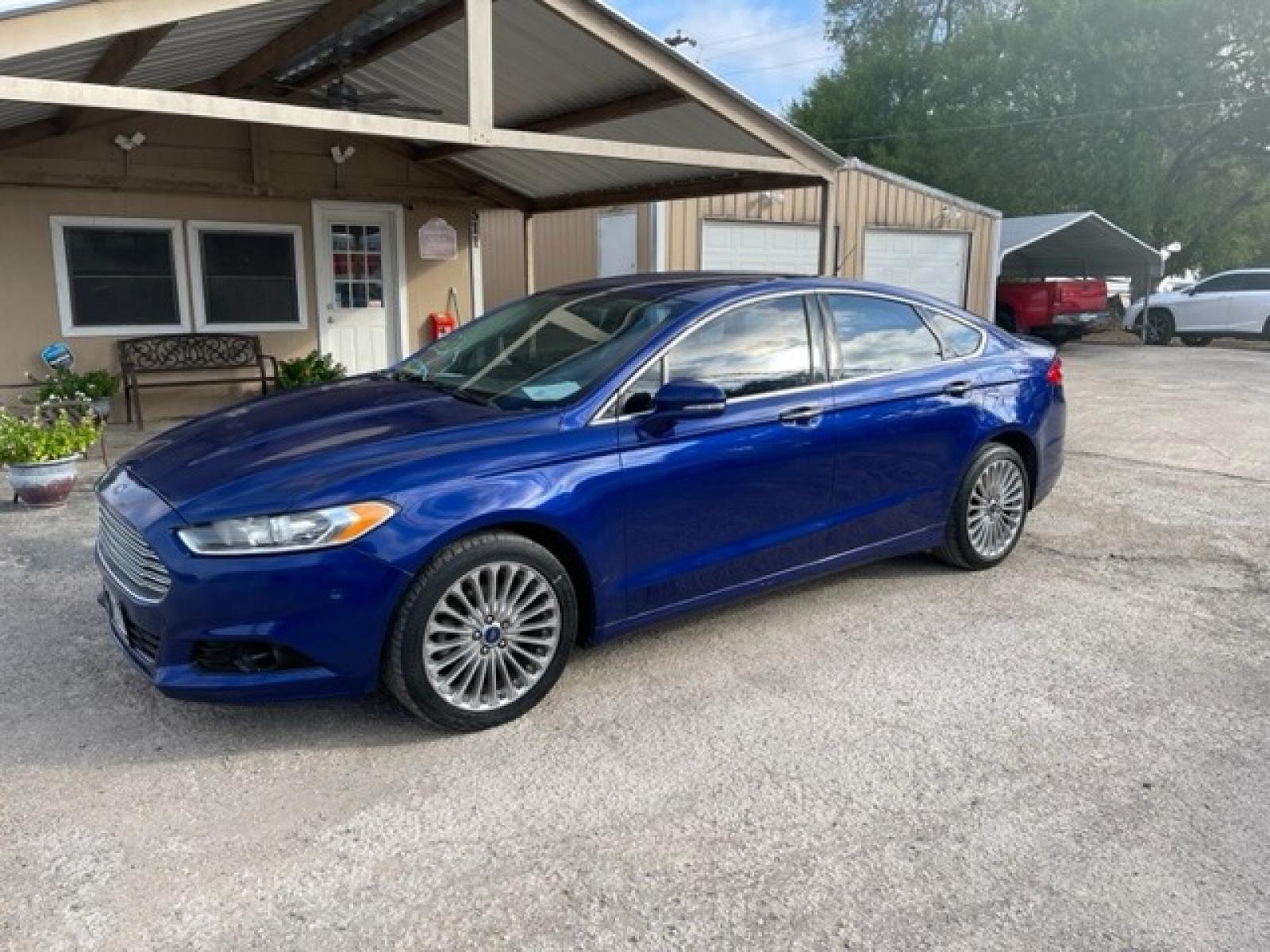 2014 BLUE FORD FUSION TITANIUM (3FA6P0D94ER) with an 2.0L engine, Automatic transmission - www.discountautosinc.com TEXT QUESTIONS TO 210-900-3118 41 MONTHLY PAYMENTS OF $340 WITH $2495 DOWN AND FINAL ODD PAYMENT OF $25.03 W/FIRST PAYMENT DUE 30 DAYS FROM DATE OF SALE. FEATURES: ALL WHEEL DR, BACK UP CAMERA, HEATED LEATHER SEATS WARRANTY ON ENGINE and TRANSMISSION O - Photo #0