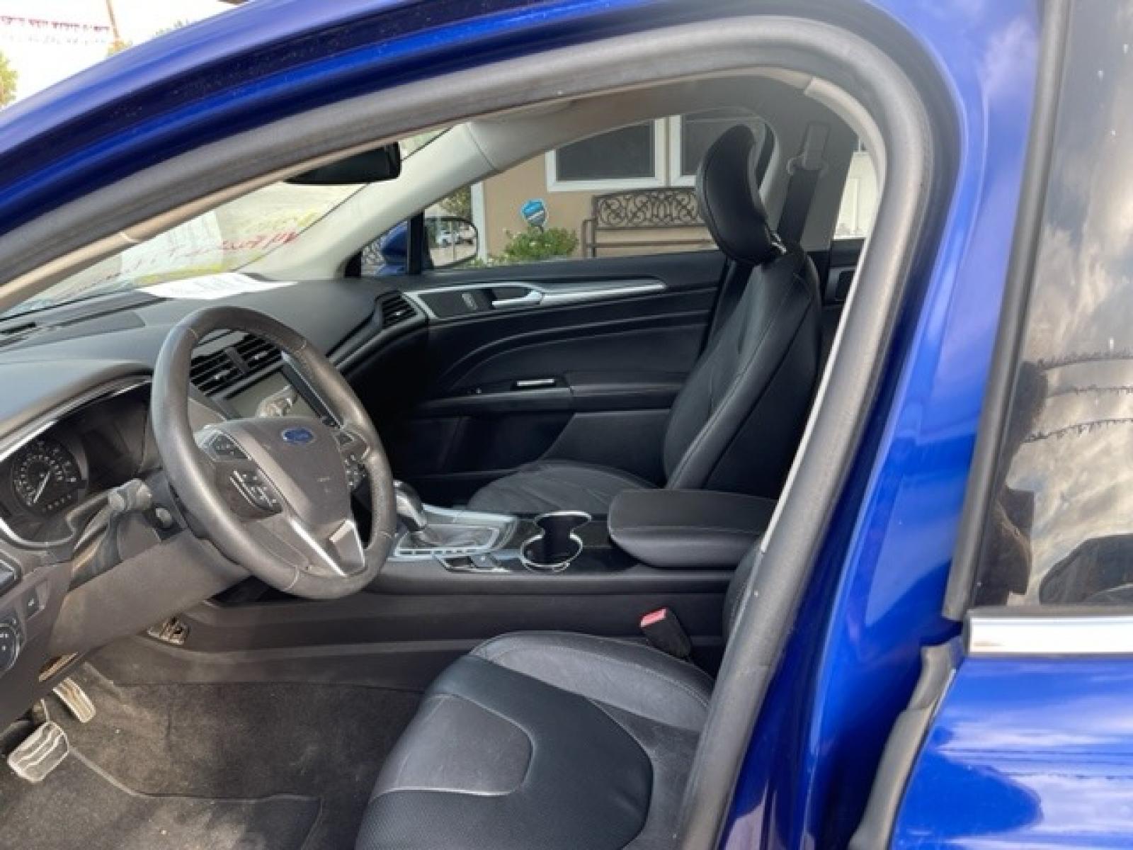 2014 BLUE FORD FUSION TITANIUM (3FA6P0D94ER) with an 2.0L engine, Automatic transmission - www.discountautosinc.com TEXT QUESTIONS TO 210-900-3118 41 MONTHLY PAYMENTS OF $340 WITH $2495 DOWN AND FINAL ODD PAYMENT OF $25.03 W/FIRST PAYMENT DUE 30 DAYS FROM DATE OF SALE. FEATURES: ALL WHEEL DR, BACK UP CAMERA, HEATED LEATHER SEATS WARRANTY ON ENGINE and TRANSMISSION O - Photo #1