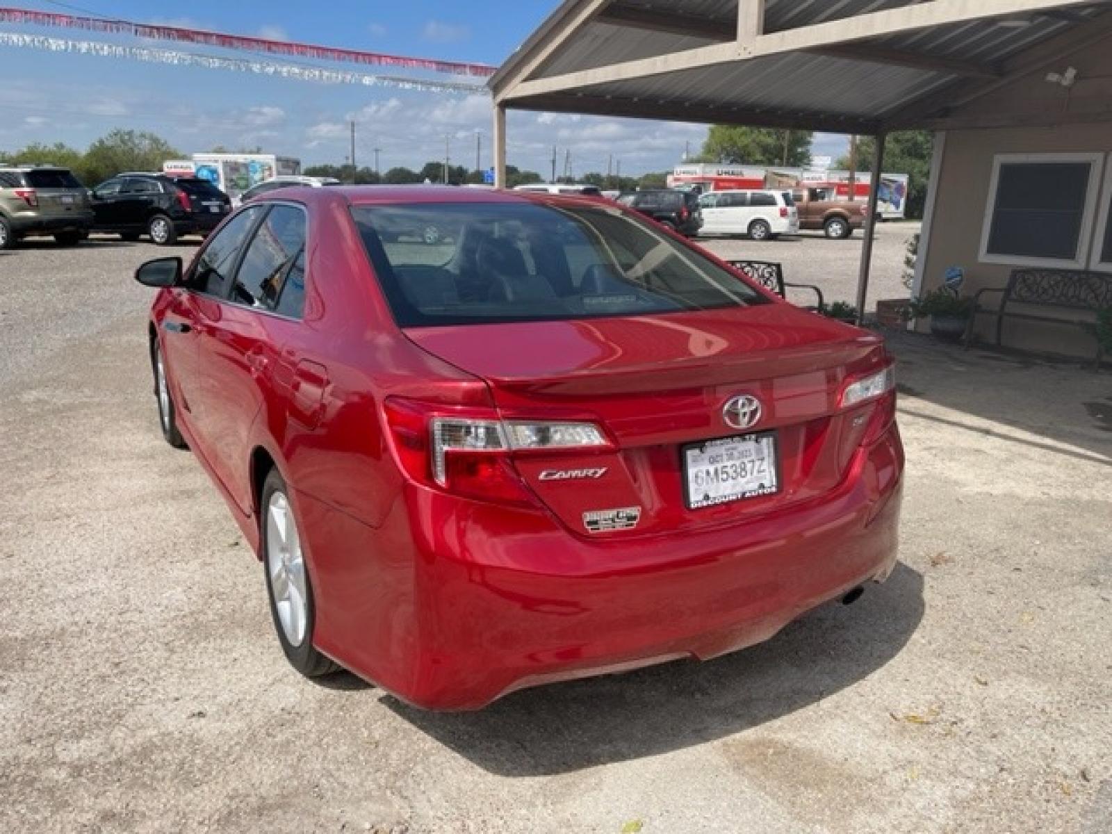 2014 RED TOYOTA CAMRY SE (4T1BF1FK8EU) with an 2.5L engine, Automatic transmission - www.discountautosinc.com TEXT QUESTIONS TO 210-900-3118 41 MONTHLY PAYMENTS OF $300 WITH $2495 DOWN AND FINAL ODD PAYMENT OF $153.01 W/FIRST PAYMENT DUE 30 DAYS FROM DATE OF SALE. FEATURES: BACK UP CAMERA, BLUE TOOTH WARRANTY ON ENGINE and TRANSMISSION ONLY FOR 3 MONTHS OR 3, - Photo #1