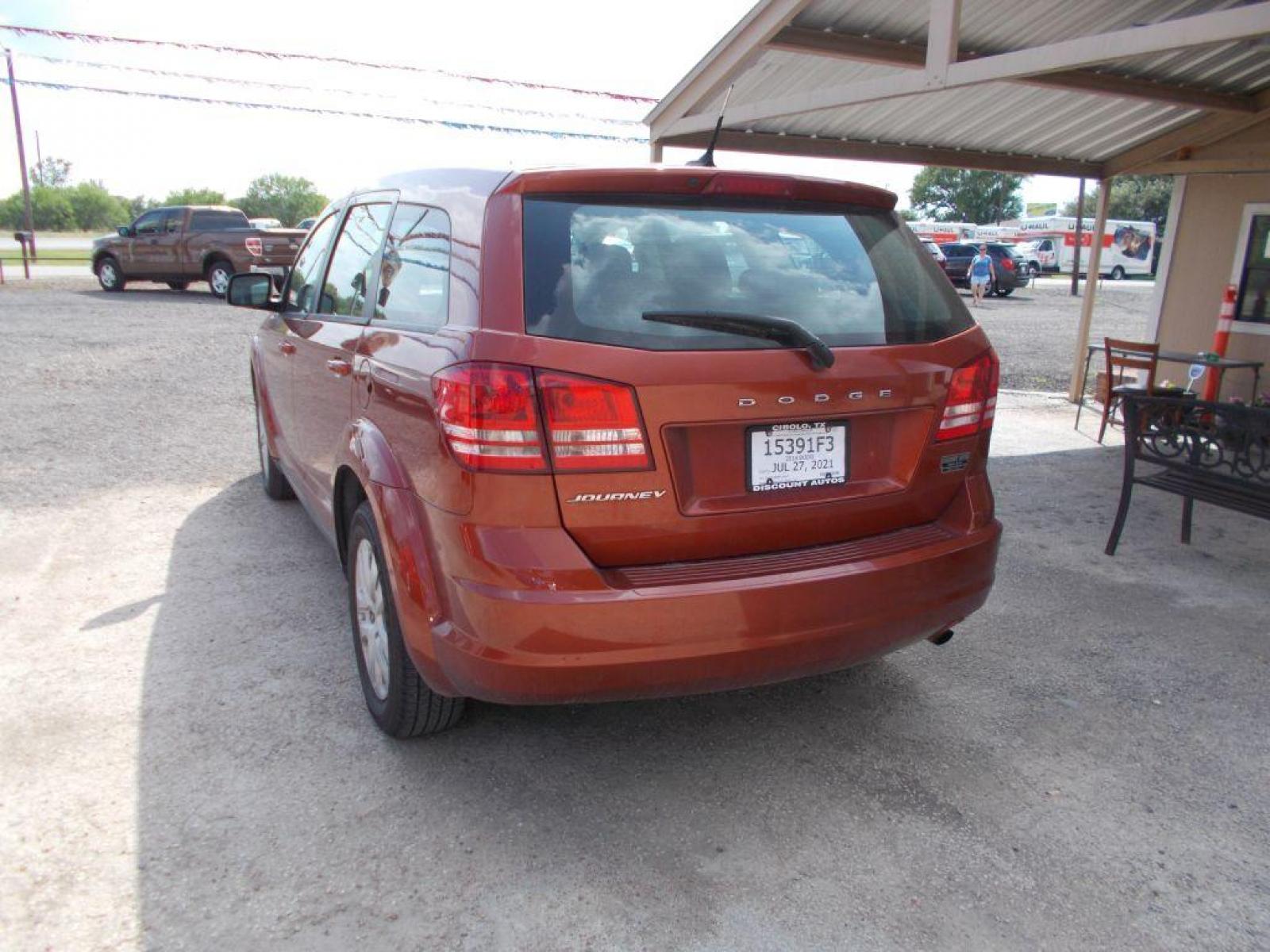 2014 ORANGE DODGE JOURNEY SE (3C4PDCAB0ET) with an 2.4L engine, Automatic transmission, located at 124 Elm St., Cibolo, TX, 78108, (210) 658-3118, 29.559427, -98.232384 - www.discountautosinc.com TEXT QUESTIONS TO 210-900-3118 35 MONTHLY PAYMENTS OF $320 WITH $1895 DOWN AND FINAL ODD PAYMENT OF $77.87 W/FIRST PAYMENT DUE 30 DAYS FROM DATE OF SALE. FEATURES: BLUE TOOTH, 3RD ROW SEATING WARRANTY ON ENGINE and TRANSMISSION ONLY FOR 3 MONTHS OR 3 - Photo #2