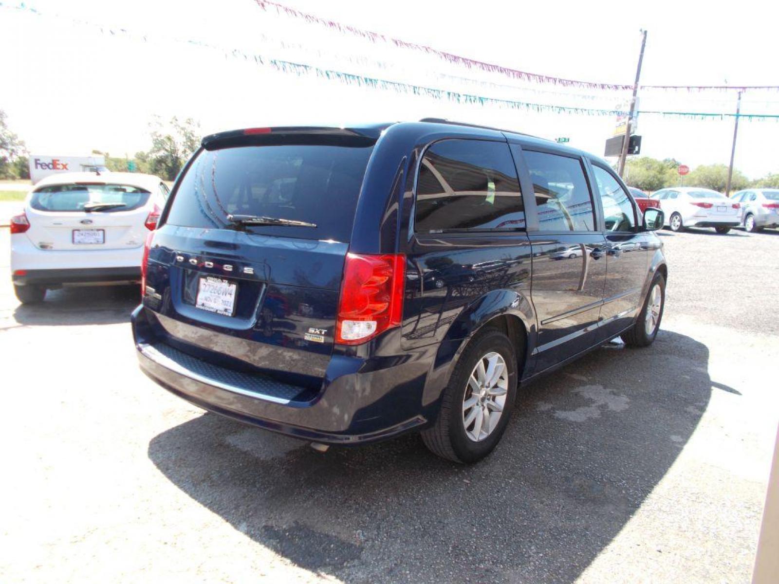 2015 BLUE DODGE GRAND CARAVAN SXT (2C4RDGCG2FR) with an 3.6L engine, Automatic transmission, located at 124 Elm St., Cibolo, TX, 78108, (210) 658-3118, 29.559427, -98.232384 - www.discountautosinc.com TEXT QUESTIONS TO 210-900-3118 41 MONTHLY PAYMENTS OF $340 WITH $1895 DOWN AND FINAL ODD PAYMENT OF $190.47 W/FIRST PAYMENT DUE 30 DAYS FROM DATE OF SALE. FEATURES: ELECTRIC SLIDING DOORS and BACK LIFT GATE WARRANTY ON ENGINE and TRANSMISSION ONLY - Photo #14