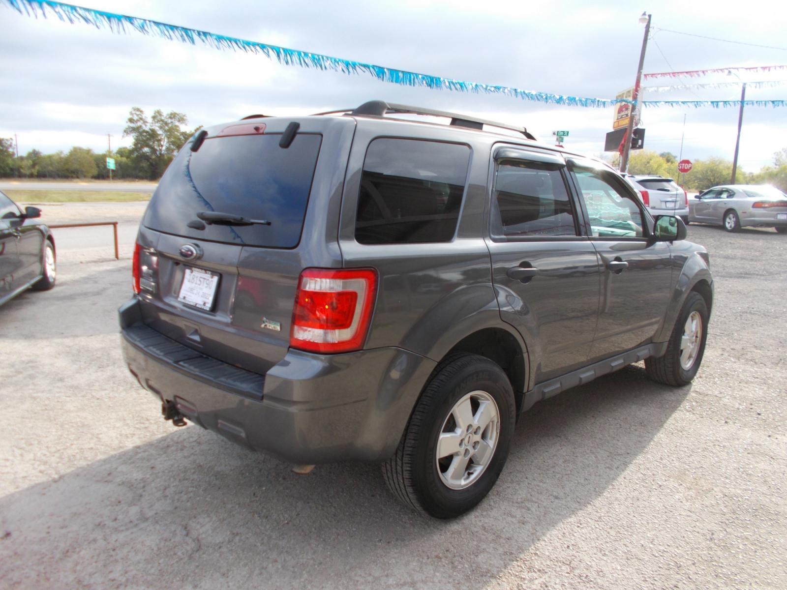 2012 GRAY FORD ESCAPE XLT (1FMCU9DG9CK) with an 3.0L engine, Automatic transmission, located at 124 Elm St., Cibolo, TX, 78108, (210) 658-3118, 29.559427, -98.232384 - www.discountautosinc.com TEXT QUESTIONS TO 210-900-3118 35 MONTHLY PAYMENTS OF $320 WITH $1895 DOWN AND FINAL ODD PAYMENT OF $69.11 W/FIRST PAYMENT DUE 30 DAYS FROM DATE OF SALE. FEATURES: BLUE TOOTH, SUN ROOF WARRANTY ON ENGINE and TRANSMISSION ONLY FOR 3 MONTHS OR 3,000 ML - Photo #6