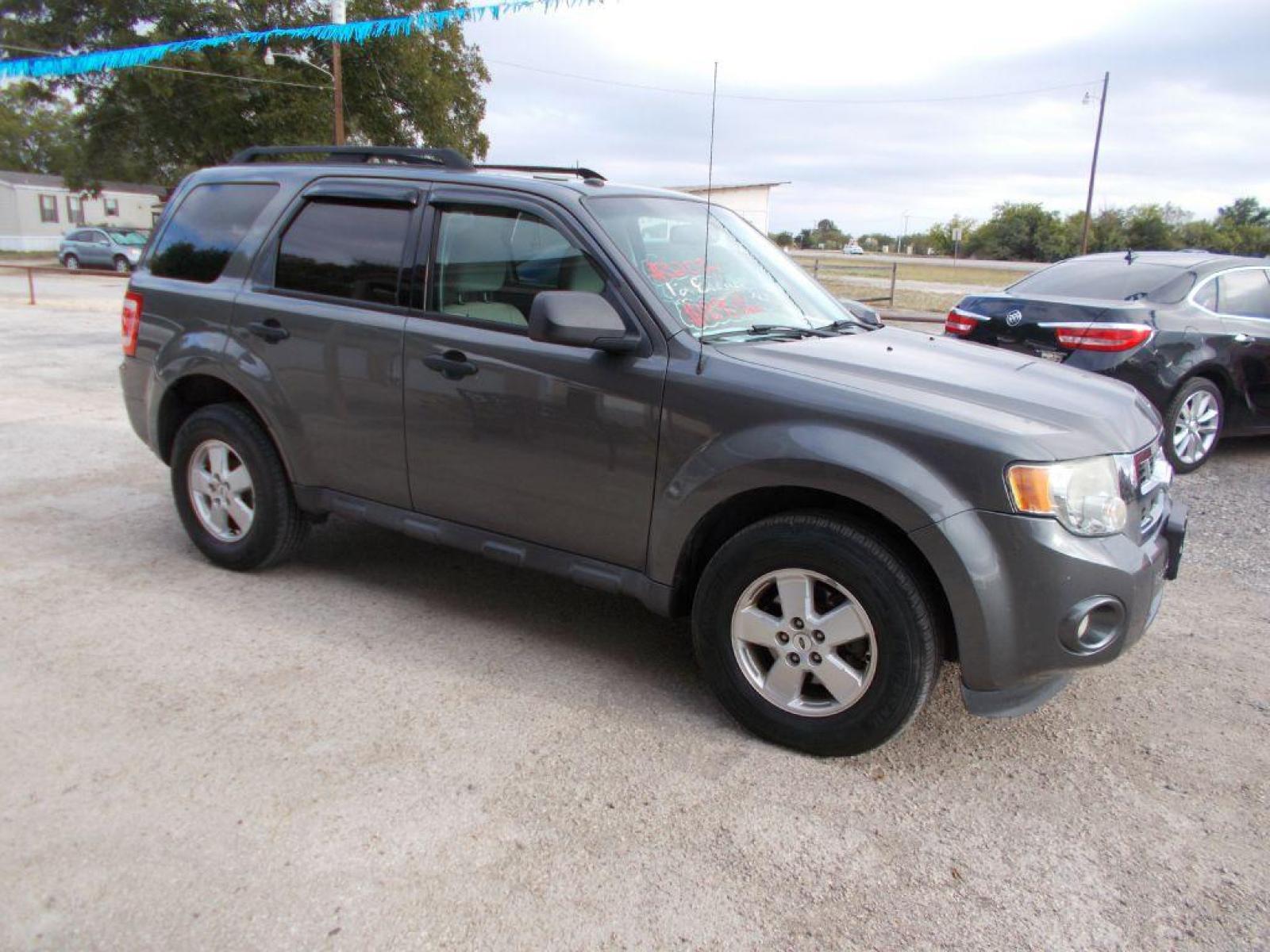 2012 GRAY FORD ESCAPE XLT (1FMCU9DG9CK) with an 3.0L engine, Automatic transmission, located at 124 Elm St., Cibolo, TX, 78108, (210) 658-3118, 29.559427, -98.232384 - www.discountautosinc.com TEXT QUESTIONS TO 210-900-3118 35 MONTHLY PAYMENTS OF $320 WITH $1895 DOWN AND FINAL ODD PAYMENT OF $69.11 W/FIRST PAYMENT DUE 30 DAYS FROM DATE OF SALE. FEATURES: BLUE TOOTH, SUN ROOF WARRANTY ON ENGINE and TRANSMISSION ONLY FOR 3 MONTHS OR 3,000 ML - Photo #21