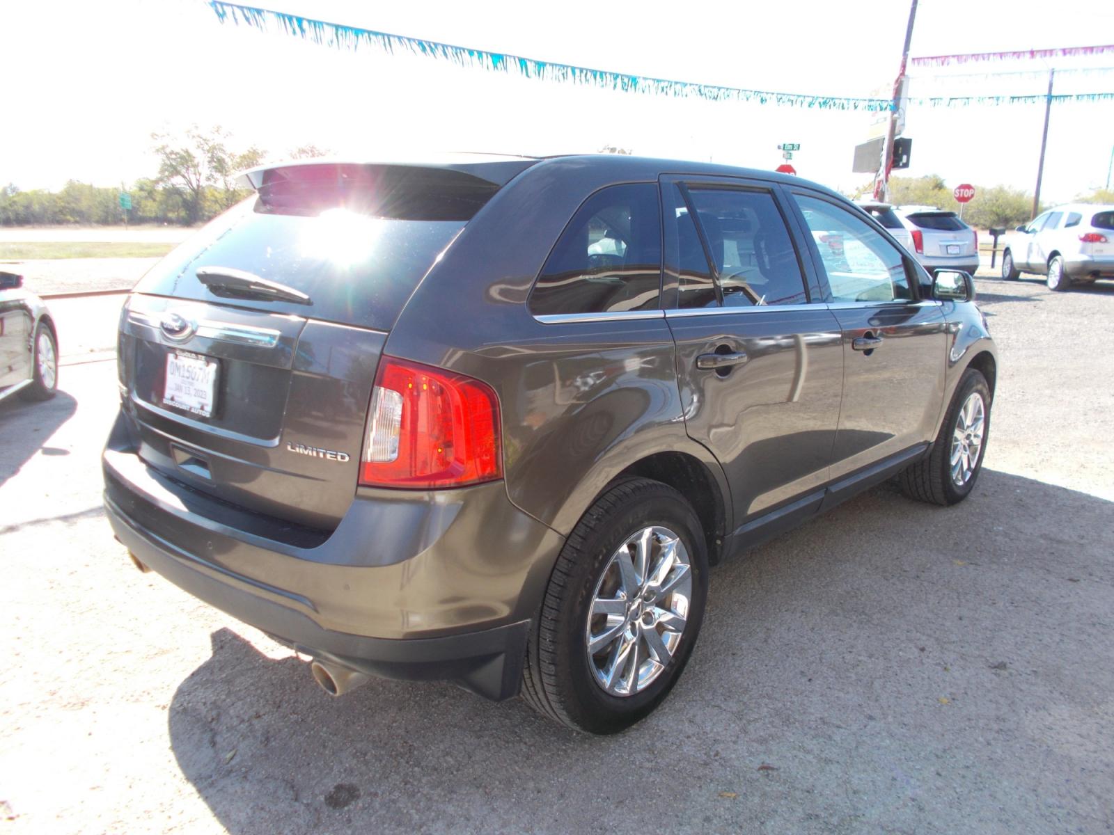 2011 BROWN FORD EDGE LIMITED (2FMDK3KC4BB) with an 3.5L engine, Automatic transmission, located at 124 Elm St., Cibolo, TX, 78108, (210) 658-3118, 29.559427, -98.232384 - www.discountautosinc.com TEXT QUESTIONS TO 210-900-3118 41 MONTHLY PAYMENTS OF $325 WITH $1895 DOWN AND FINAL ODD PAYMENT OF $43.05 W/FIRST PAYMENT DUE 30 DAYS FROM DATE OF SALE. FEATURES: SUN ROOF, HEATED LEATHER SEATS, BLUE TOOTH. ** NO WARRANTY, SOLD AS IS ** 42 MO'S TERM W/ - Photo #4