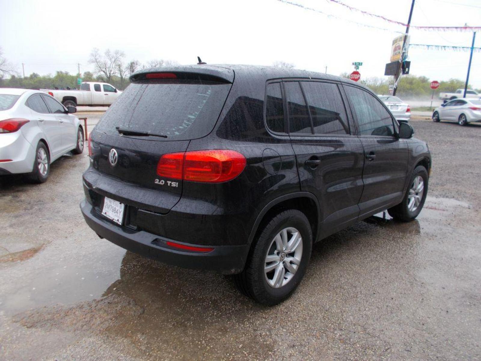 2013 BLACK VOLKSWAGEN TIGUAN S (WVGAV3AX4DW) with an 2.0L engine, Automatic transmission, located at 124 Elm St., Cibolo, TX, 78108, (210) 658-3118, 29.559427, -98.232384 - Photo #4