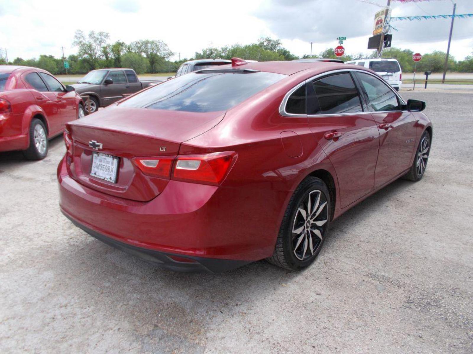 2016 RED CHEVROLET MALIBU LT (1G1ZE5ST6GF) with an 1.5L engine, Automatic transmission, located at 124 Elm St., Cibolo, TX, 78108, (210) 658-3118, 29.559427, -98.232384 - www.discountautosinc.com TEXT QUESTIONS TO 210-900-3118 41 MONTHLY PAYMENTS OF $385 WITH $2695 DOWN AND FINAL ODD PAYMENT OF $267.80 W/FIRST PAYMENT DUE 30 DAYS FROM DATE OF SALE. FEATURE: PANORAMIC SUNROOF, BACK UP CAMERA, HEATED/ LEATHER SEATS, WARRANTY ON ENGINE and TRANSMIS - Photo #5